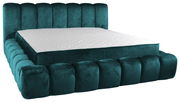 Polsterbett in smaragdgrünem Samt mit gestepptem Kopfteil, seitliche Perspektive