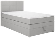 Graues Boxspringbett mit weißer Matratze, seitliche Perspektive