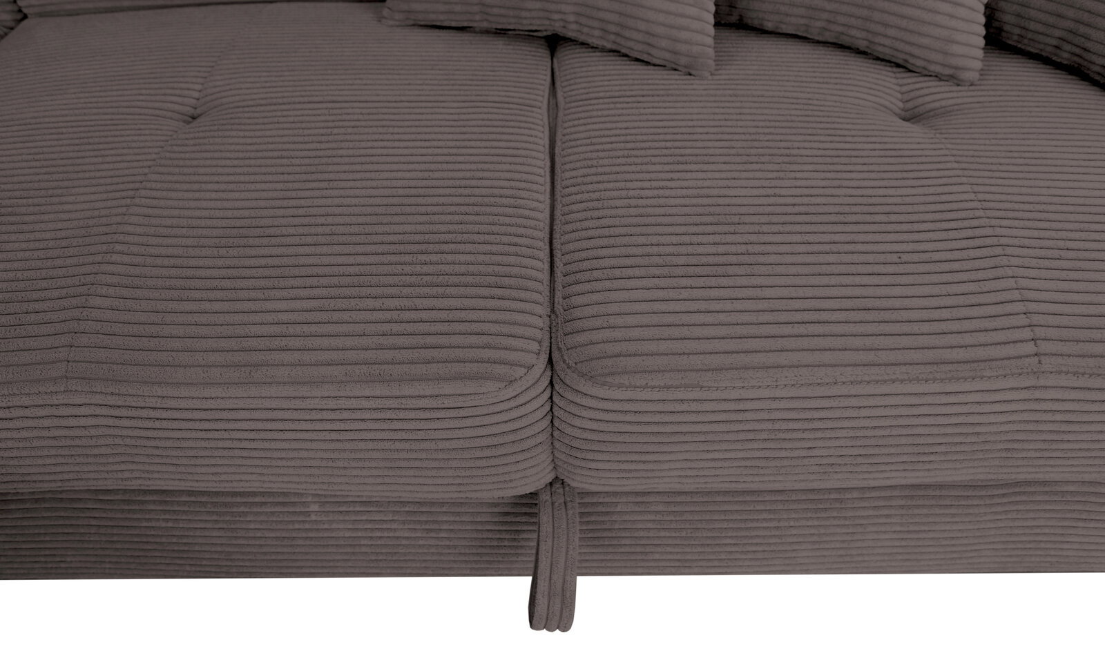 Nahaufnahme einer grauen, gerippten Polsteroberfläche eines Sofas, von oben betrachtet.