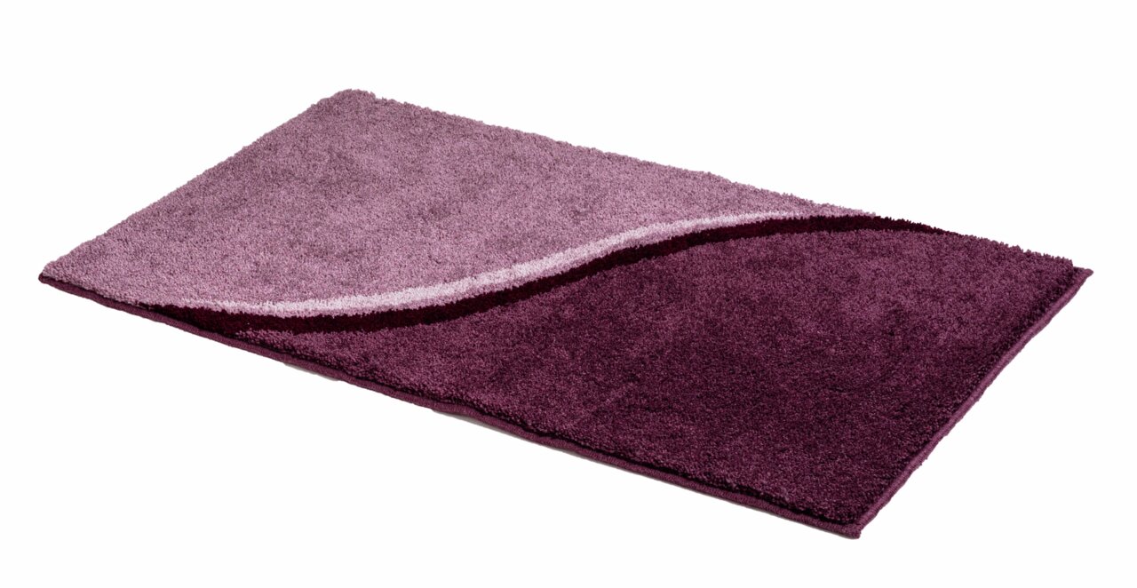 Lila Badteppich 55x60cm mit wellenförmigem Design, seitliche Perspektive