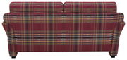 Rückansicht eines dreisitzigen Sofas mit kariertem Stoffmuster in Rot- und Grüntönen.