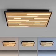 Moderne Wand- und Deckenleuchte Q-AKUS mit Holzlamellen und integrierter LED-Beleuchtung, Perspektive von unten.