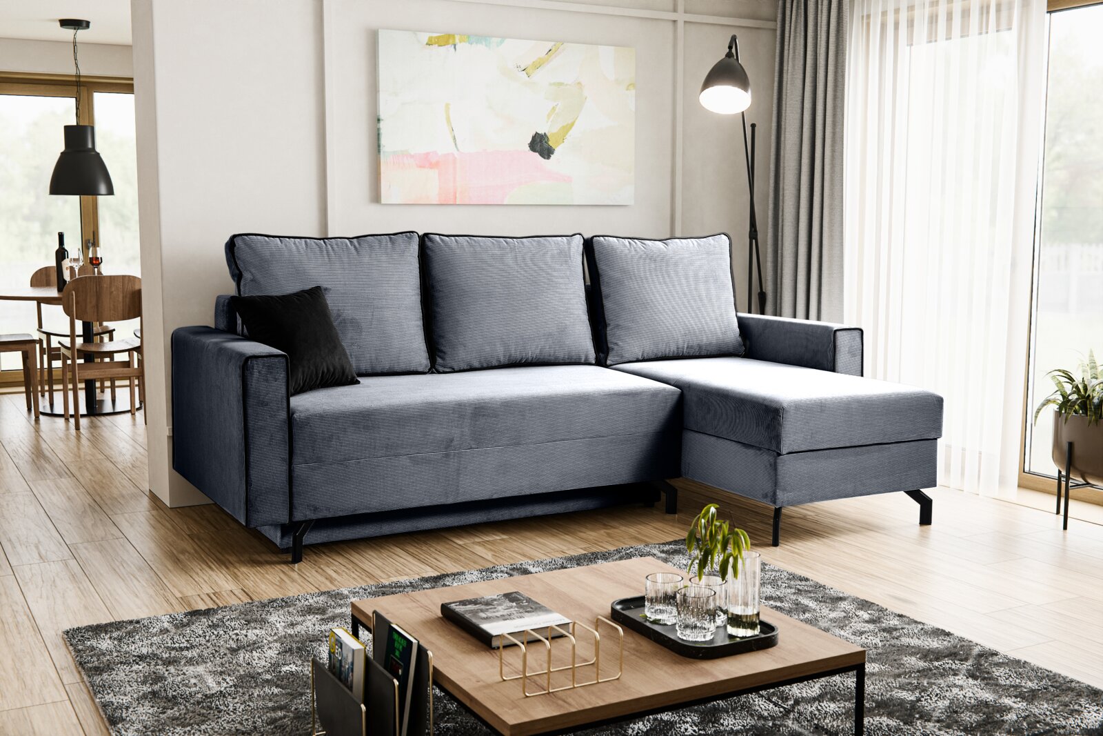 Modernes Schlafsofa in L-Form mit rechter Ausrichtung, in einem stilvollen Wohnzimmer mit Holzboden und großen Fenstern, seitliche Perspektive.