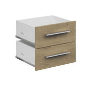 Schmales Schubladen-Set mit zwei Holzfronten und silbernen Griffen, seitliche Perspektive