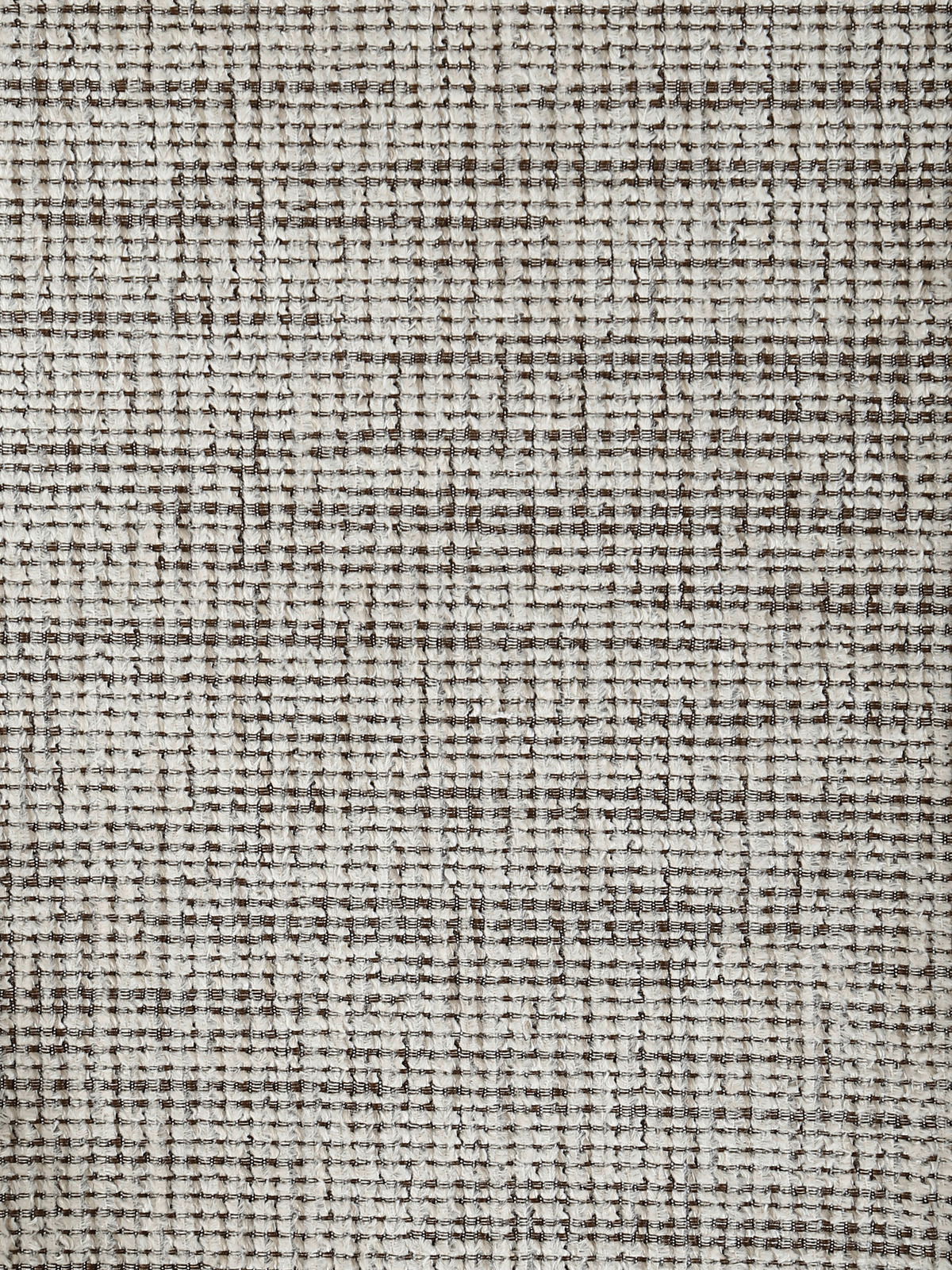 Nahaufnahme eines strukturierten, gewebten Stoffes in neutralen Tönen, verwendet für den Stuhl THEODOR.