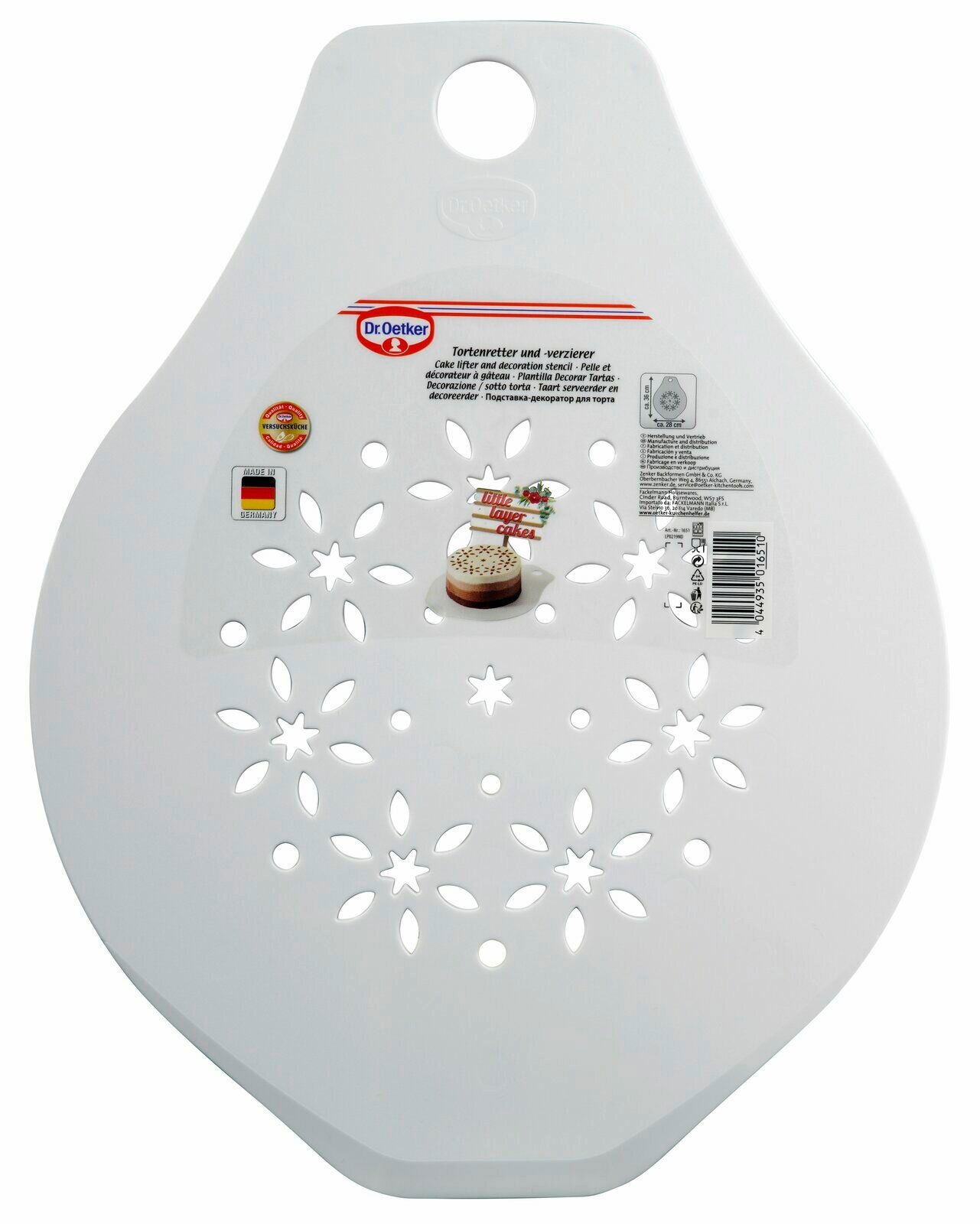 Tortenretter und -verzierer von oben mit dekorativem Muster und Griffloch.
