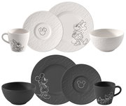 Disney Geschirrset in Schwarz und Weiß mit Tasse, Schale sowie großem und kleinem Teller, jeweils mit skizzenhaften Mickey- und Minnie-Motiven; Produktansicht von vorne in leicht schräger Perspektive.