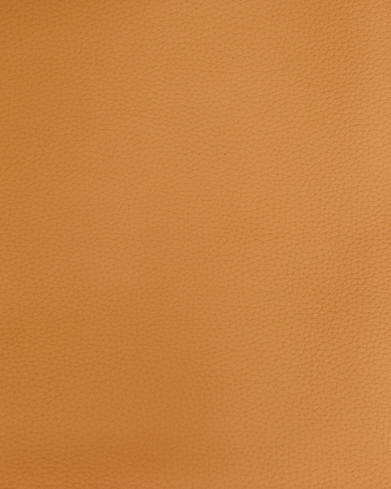 Close-up van oranje lederen bekleding, met zichtbare structuur