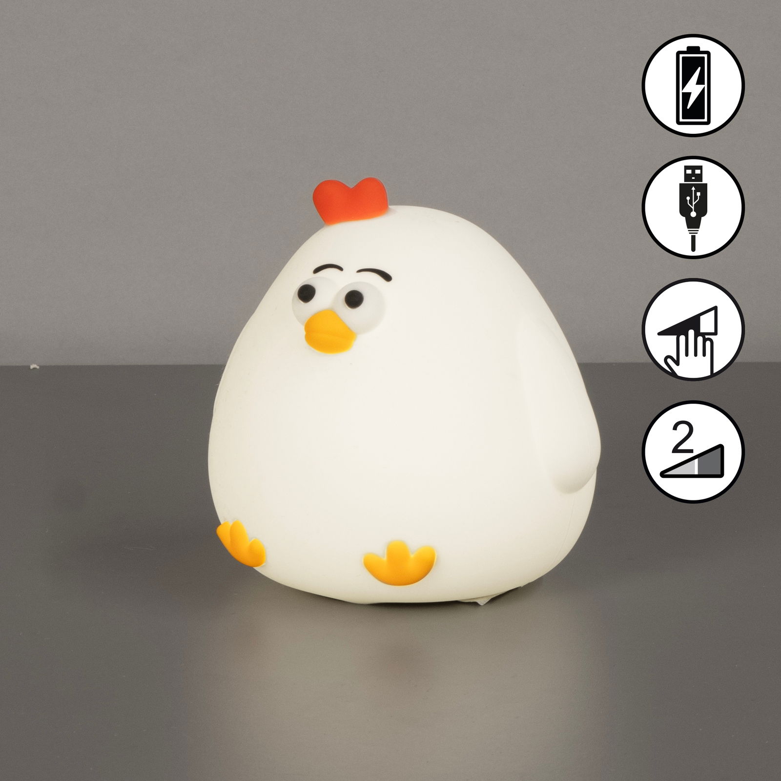 Niedliches Akku-Nachtlicht in Form eines Huhns mit rotem Kamm und gelbem Schnabel, seitliche Perspektive.