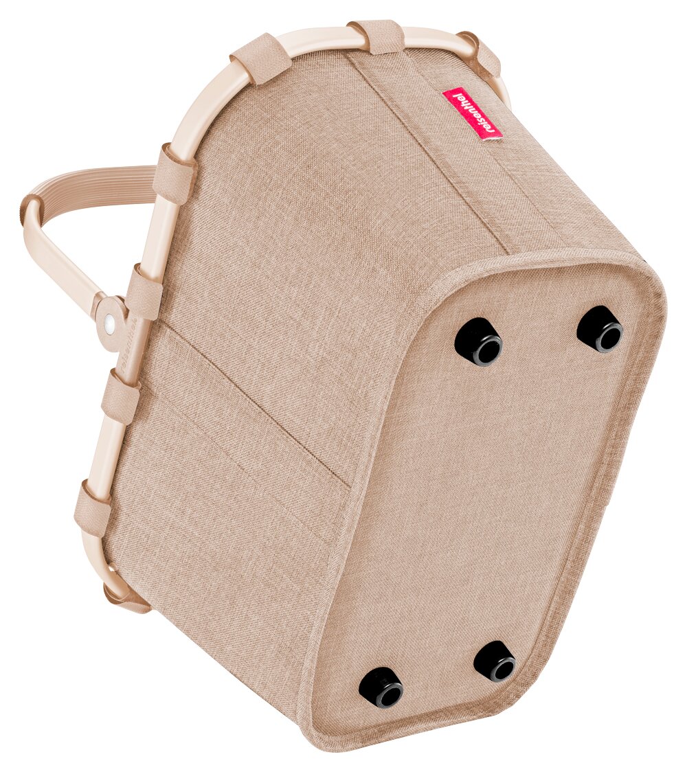 Beige boodschappenmand carrybag XS, aan de onderkant voorzien van vier zwarte pootjes en een stevig handvat.
