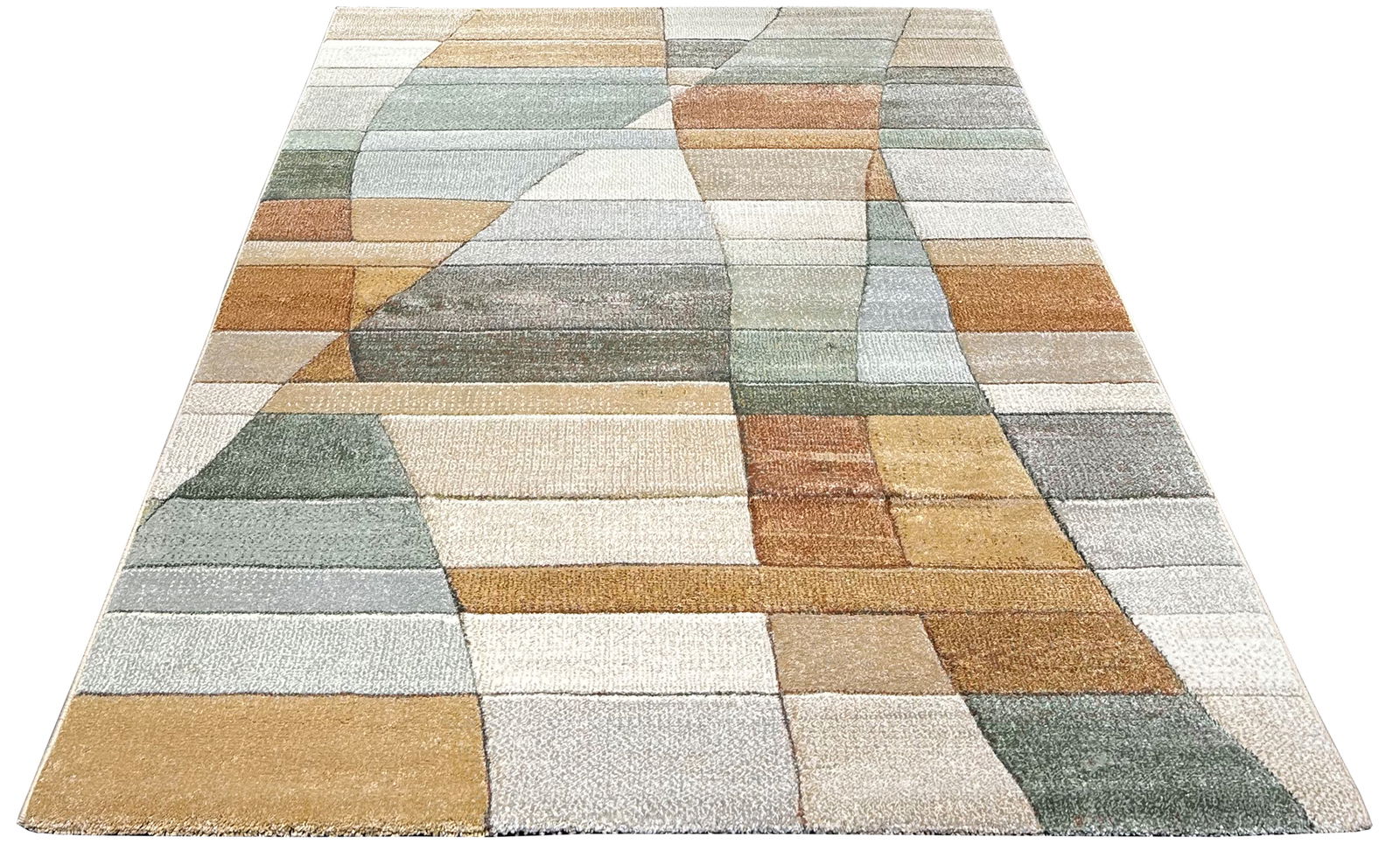 Teppich in Pastellfarben mit geometrischem Muster, aus der Perspektive von unten nach oben fotografiert.