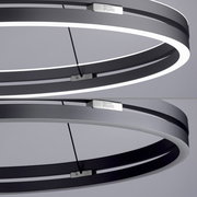 Moderne Pendelleuchte PURE-E-LOOP von Paul Neuhaus in seitlicher Perspektive, mit elegantem, ringförmigem Design und integrierter LED-Beleuchtung.