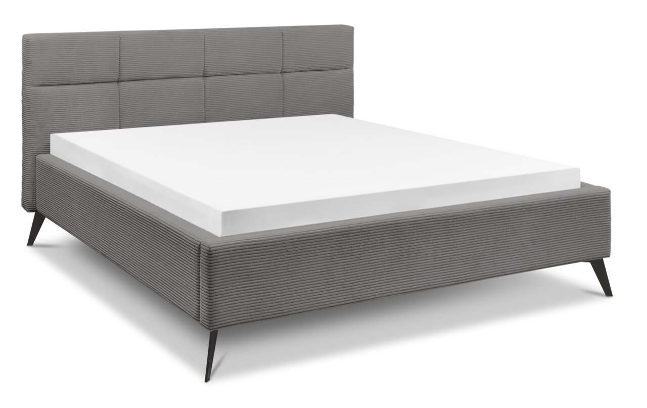 Graues Polsterbett mit gestepptem Kopfteil, seitliche Perspektive