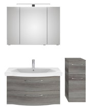 Badezimmermöbel-Set bestehend aus einem großen Spiegelschrank mit Beleuchtung, einem Waschbeckenunterschrank mit zwei Schubladen und einem schmalen Hochschrank, alles in moderner Holzoptik, frontal abgebildet.