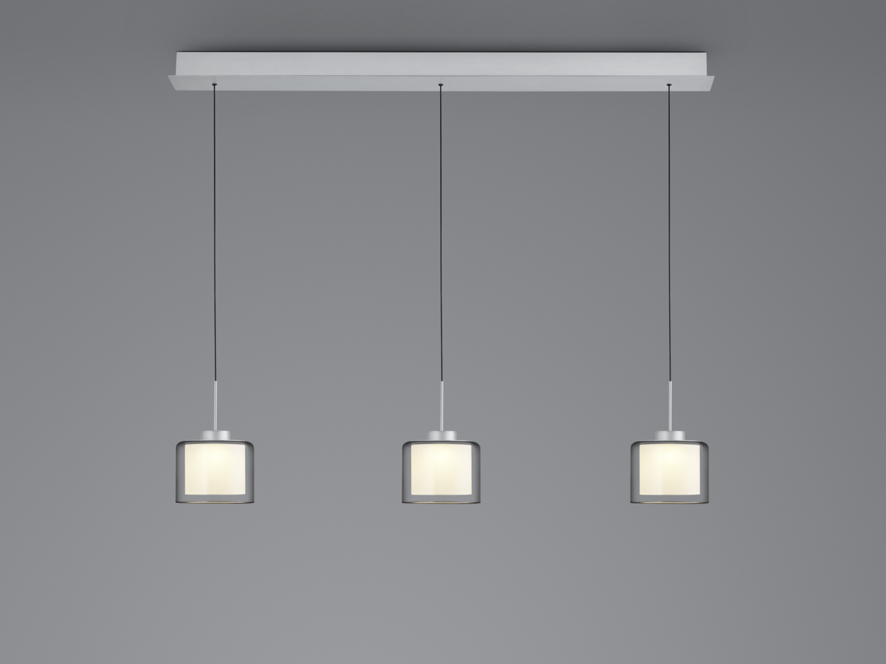 Moderne LED-Pendelleuchte mit drei zylindrischen Lampenschirmen, frontal betrachtet.