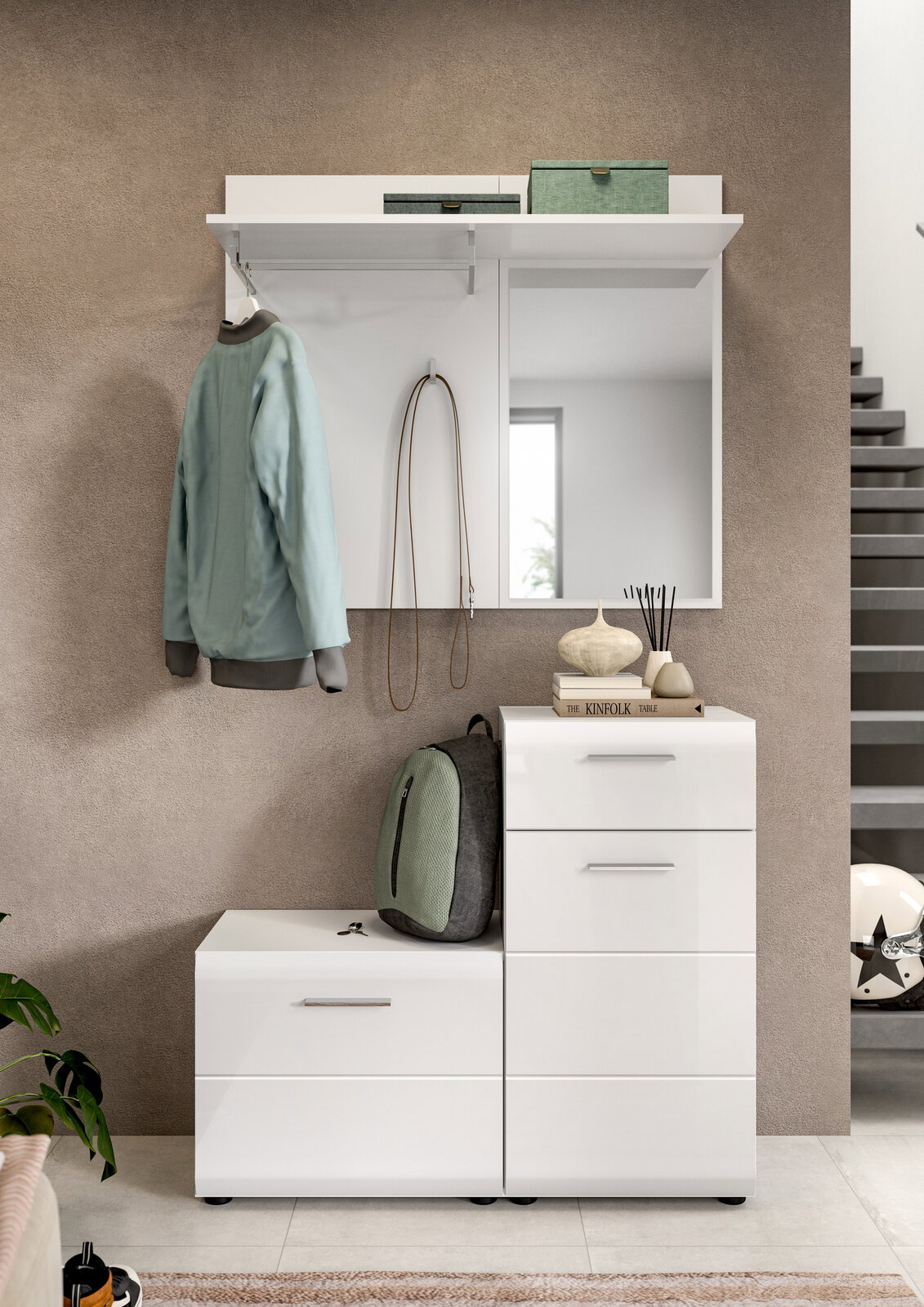 Modernes weißes Garderoben-Set im Flur mit Spiegelpaneel, Hutablage und Haken, daneben Schuhschrank/Kommode mit Schubladen; Frontansicht auf Augenhöhe.