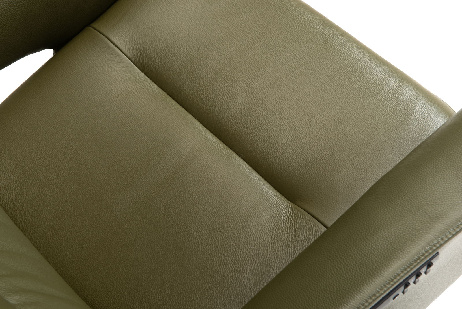 Nahaufnahme eines grünen Relaxsessels aus Leder, Ansicht von oben.
