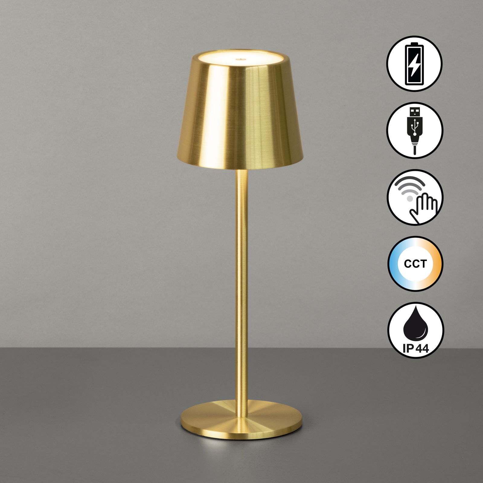 Goldene Akku-Tischleuchte ROXI mit zylindrischem Schirm, USB-Anschluss, Touch-Bedienung, CCT-Farbtemperaturregelung und IP44-Schutz, seitliche Perspektive.