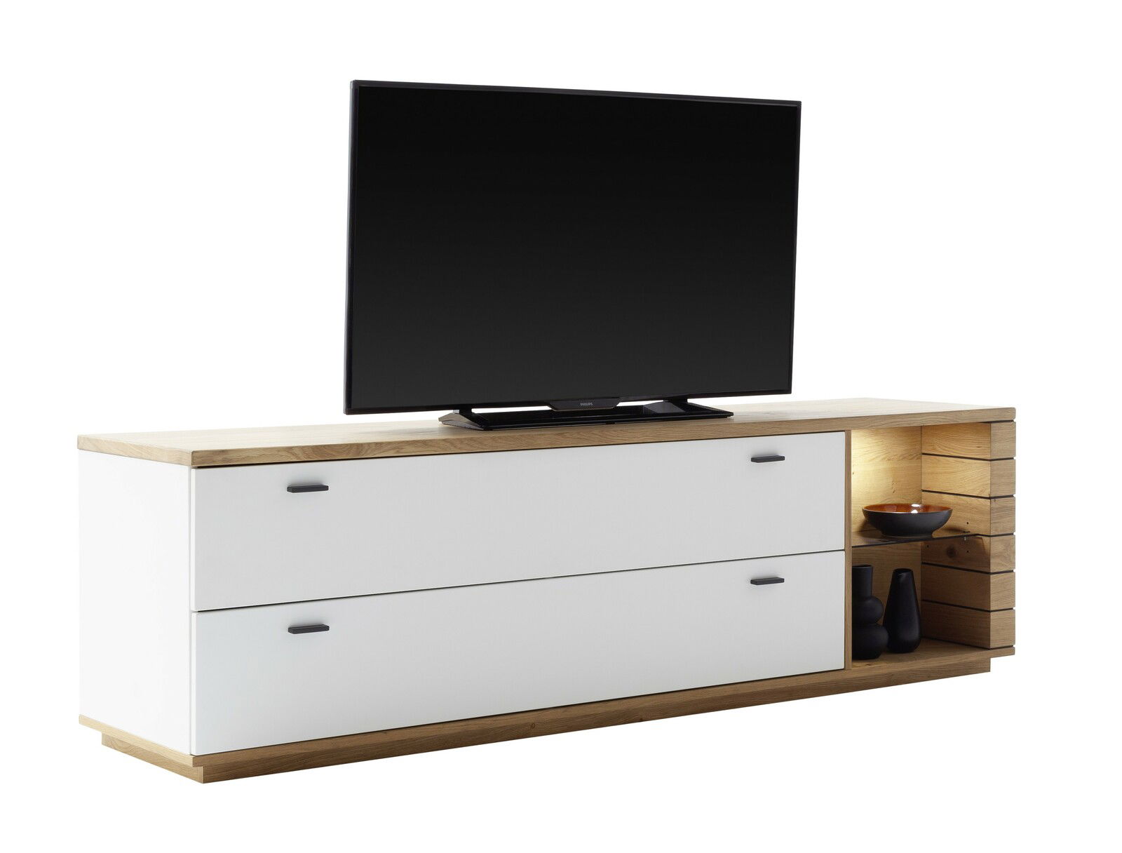 TV-Lowboard aus Holz und Weiß mit zwei Schubladen, seitlichem Regal und darauf stehendem Fernseher, Perspektive von links vorne
