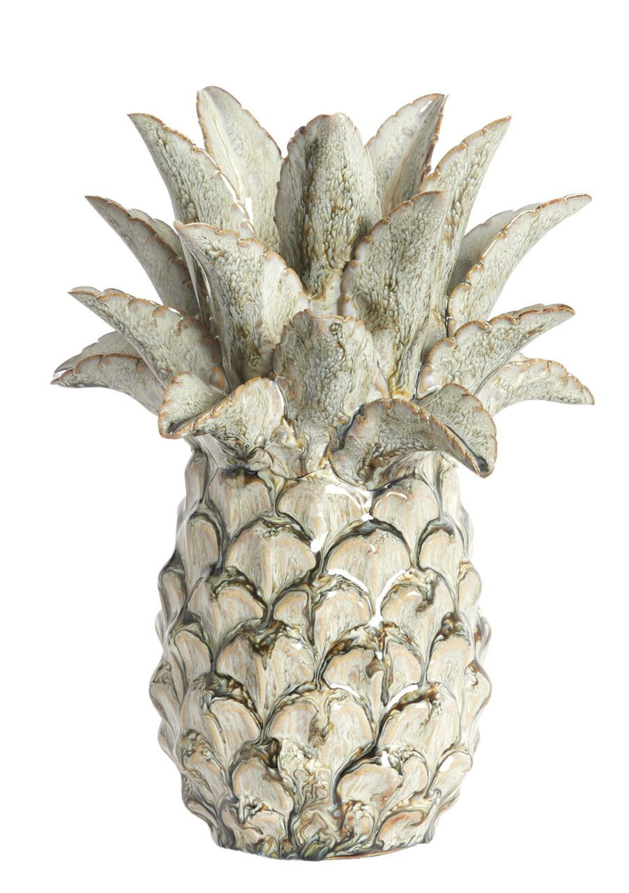 Keramik-Ornament in Form einer Ananas, aus der Frontalperspektive fotografiert.