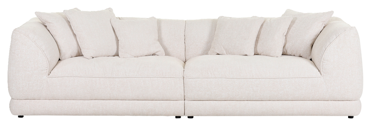 Großes, cremefarbenes Big-Sofa mit mehreren Kissen, frontal fotografiert.