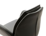 Rückansicht eines modernen Armlehnstuhls aus dunklem Leder, Fokus auf die Rückenlehne