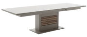 Moderne eettafel met wit tafelblad en grijze voet, zijaanzicht
