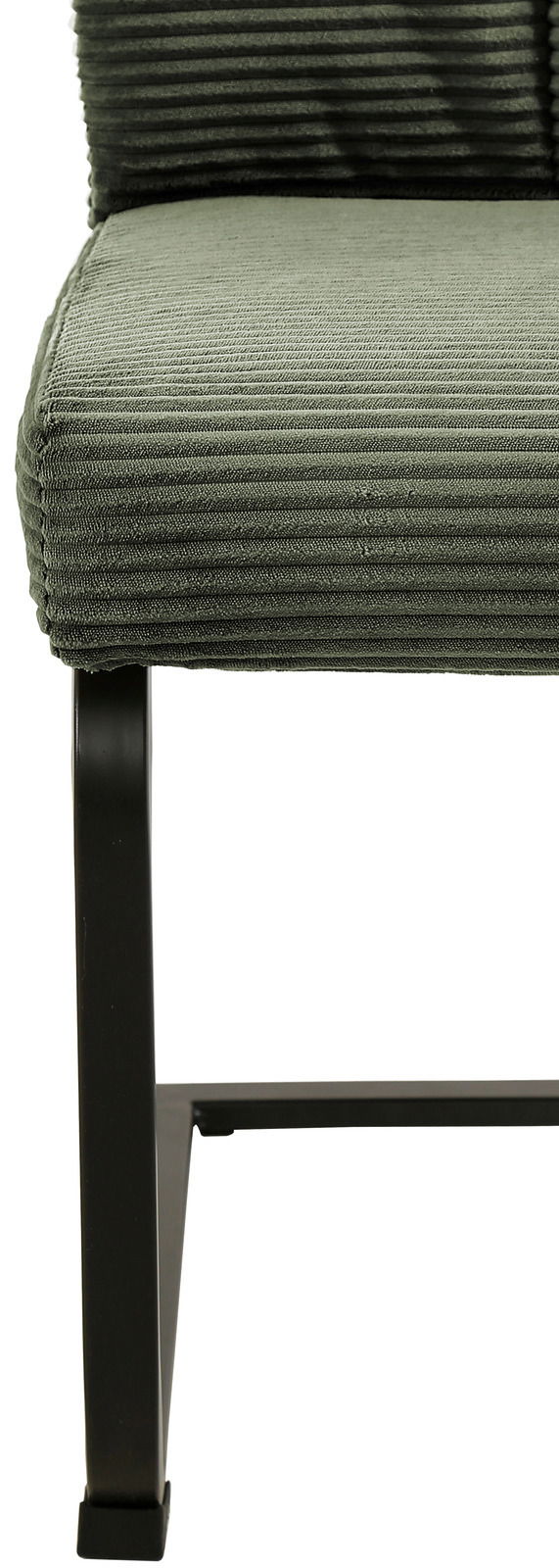 Nahaufnahme eines grünen Schwingstuhls mit geripptem Stoffbezug und schwarzem Metallgestell, seitliche Perspektive