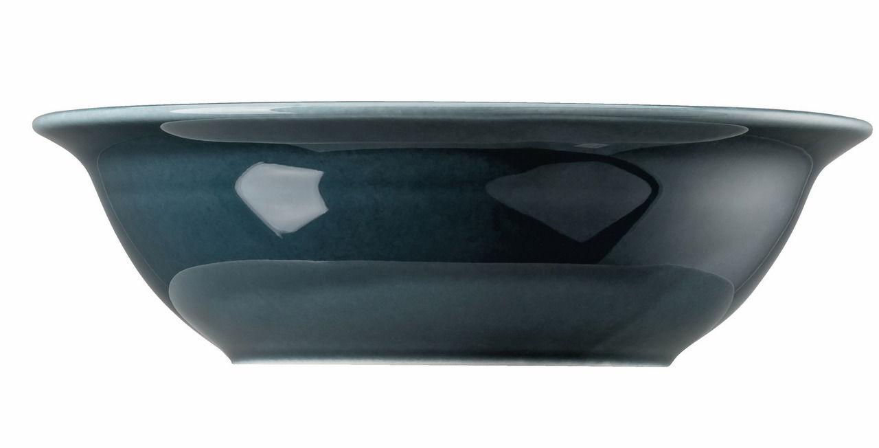 Seitliche Ansicht einer dunkelblauen Schüssel mit glänzender Oberfläche.