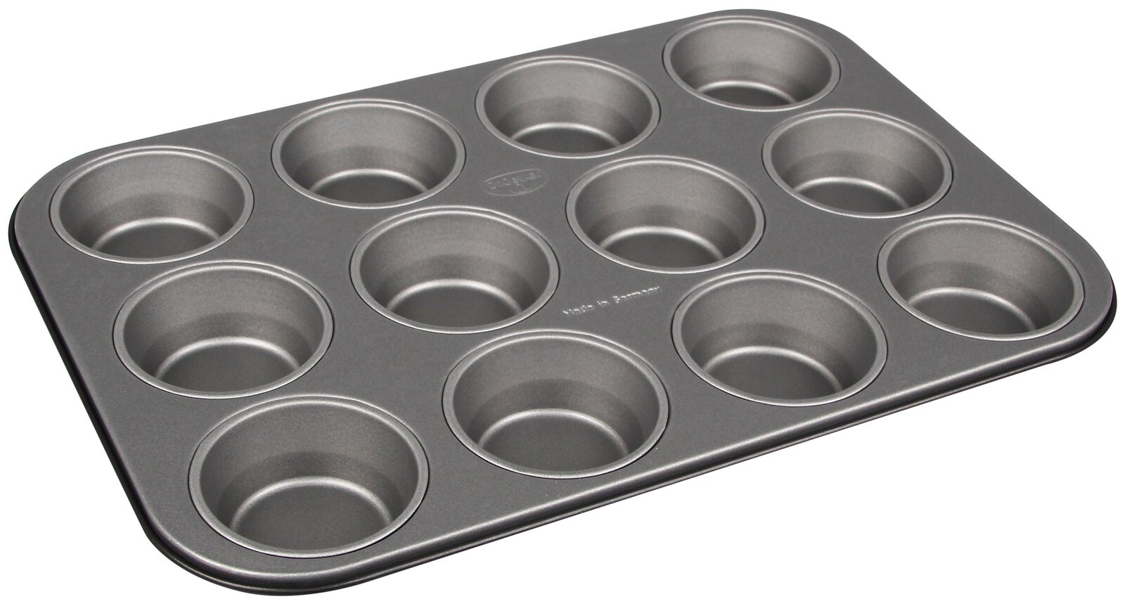 Muffinform aus Metall mit 12 Vertiefungen, schräg von oben fotografiert