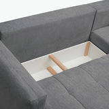 Graue Rundecke mit geöffneter Stauraumfunktion, Ansicht von oben.