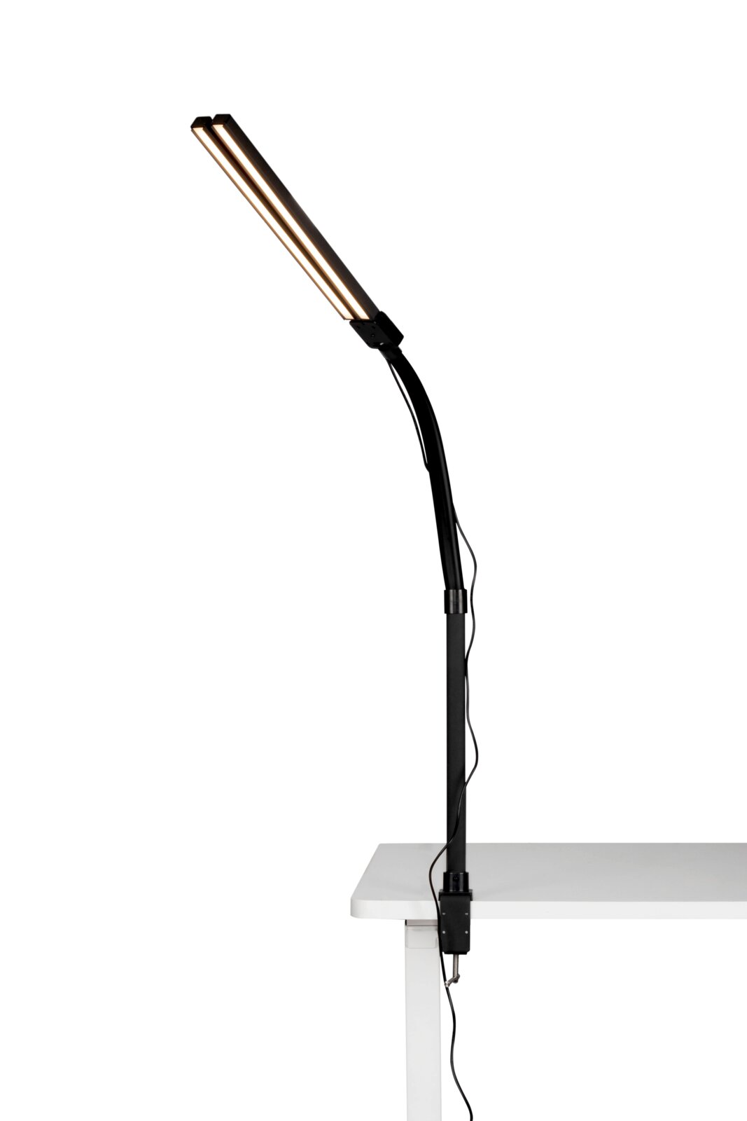 LED-Klemmleuchte in seitlicher Perspektive an einem Tisch befestigt