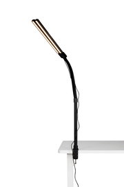 LED-Klemmleuchte in seitlicher Perspektive an einem Tisch befestigt