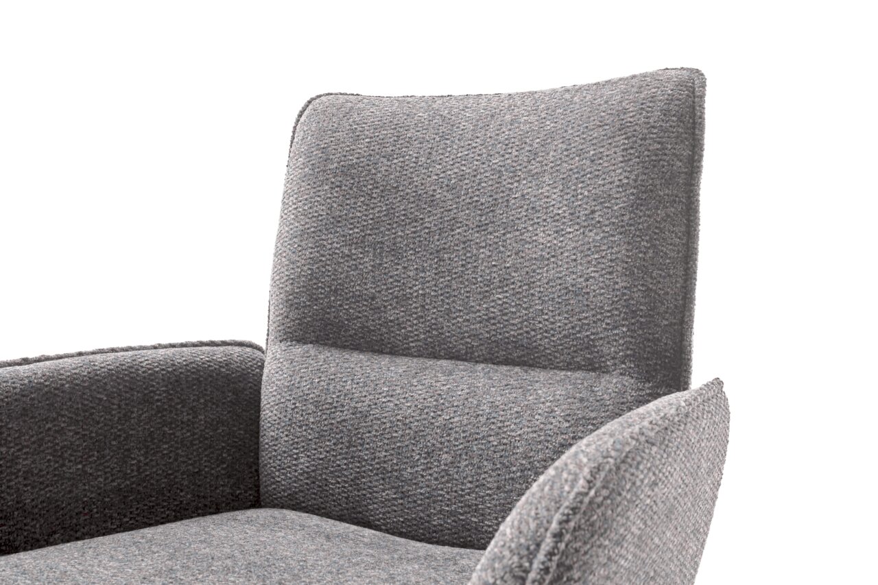 Grijze stoffen fauteuil, close-up vanaf de zijkant