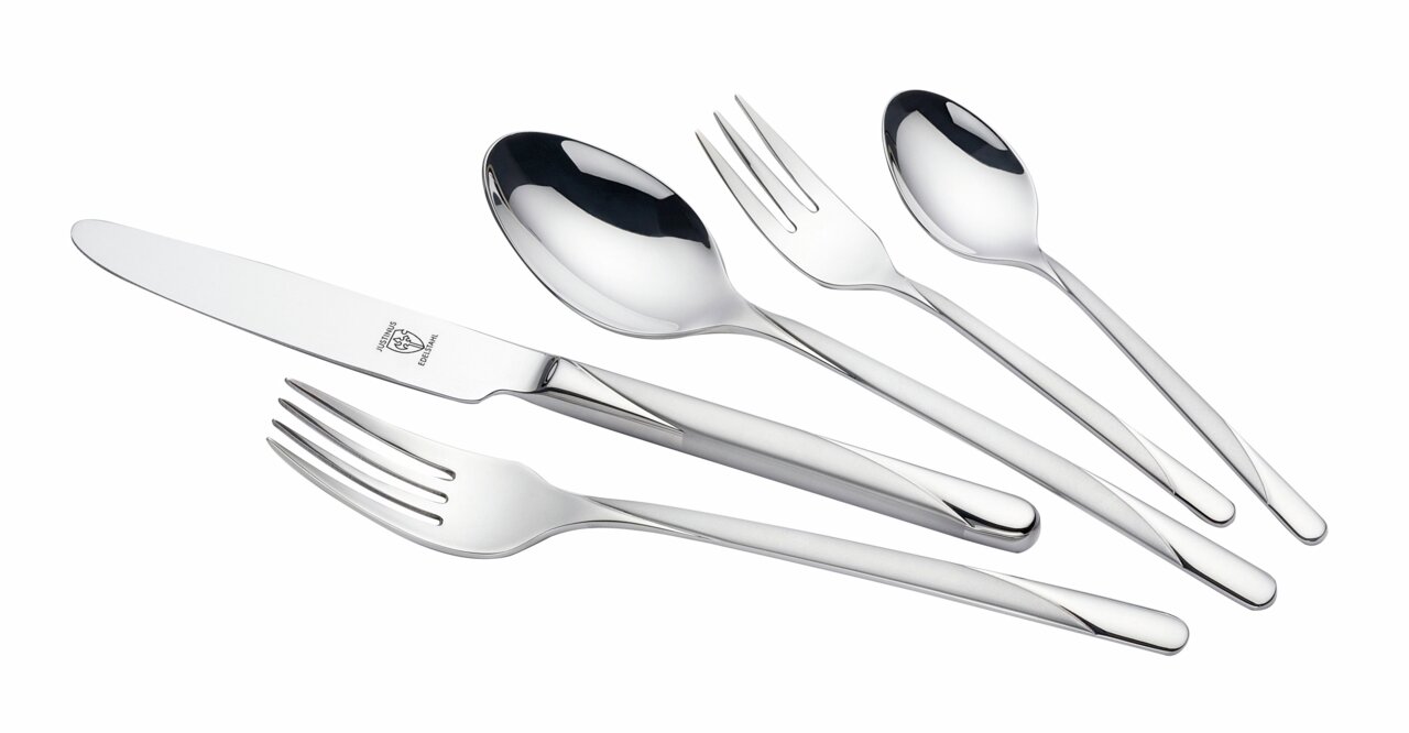 Elegantes Besteckset Flair 60-tlg. aus Edelstahl, bestehend aus Messer, Gabel, Löffel und Dessertgabel, in seitlicher Perspektive.