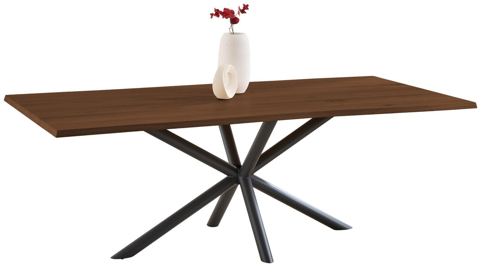 Rechthoekige houten eettafel met donkerbruin tafelblad en zwart metalen sterpootonderstel, schuin van voren gefotografeerd op witte achtergrond