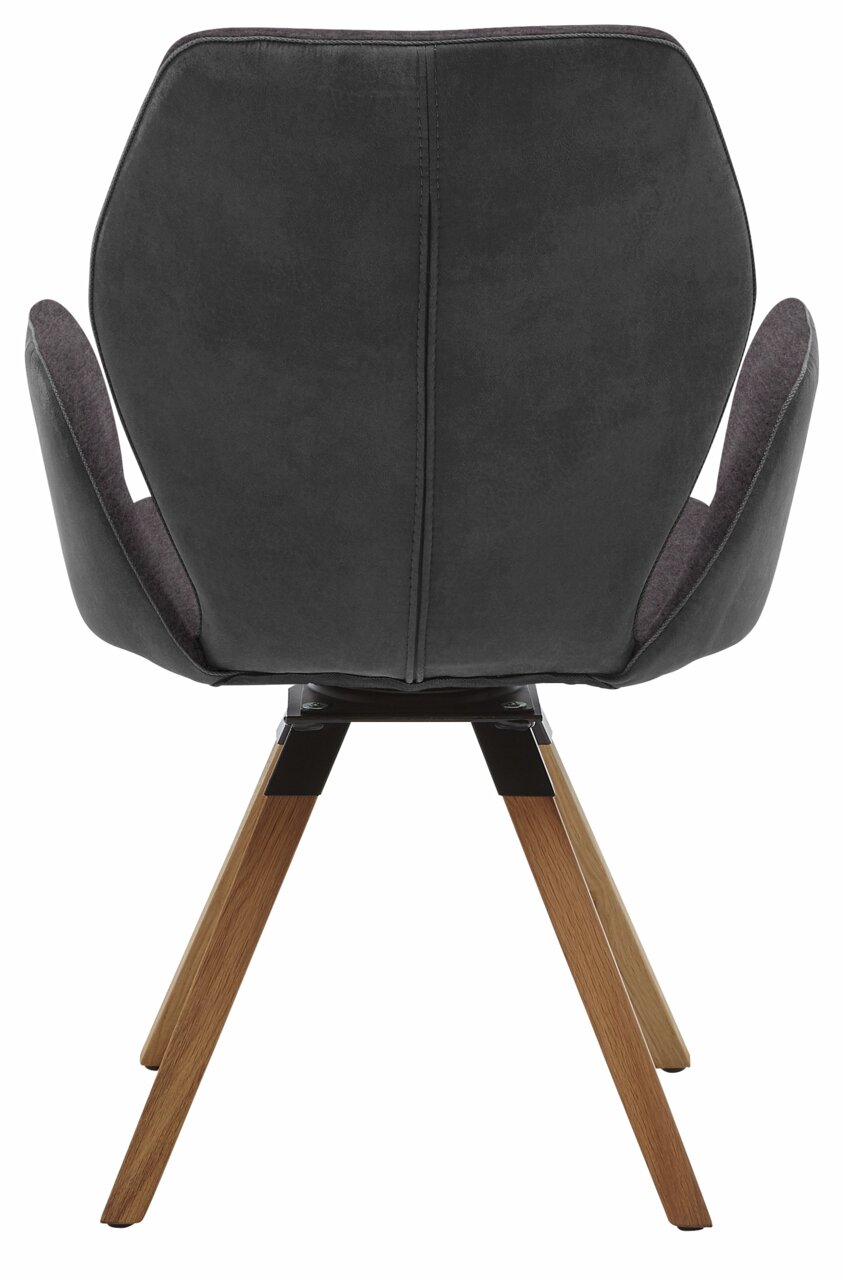 Achterkant van een moderne fauteuil met donkere bekleding en houten poten.