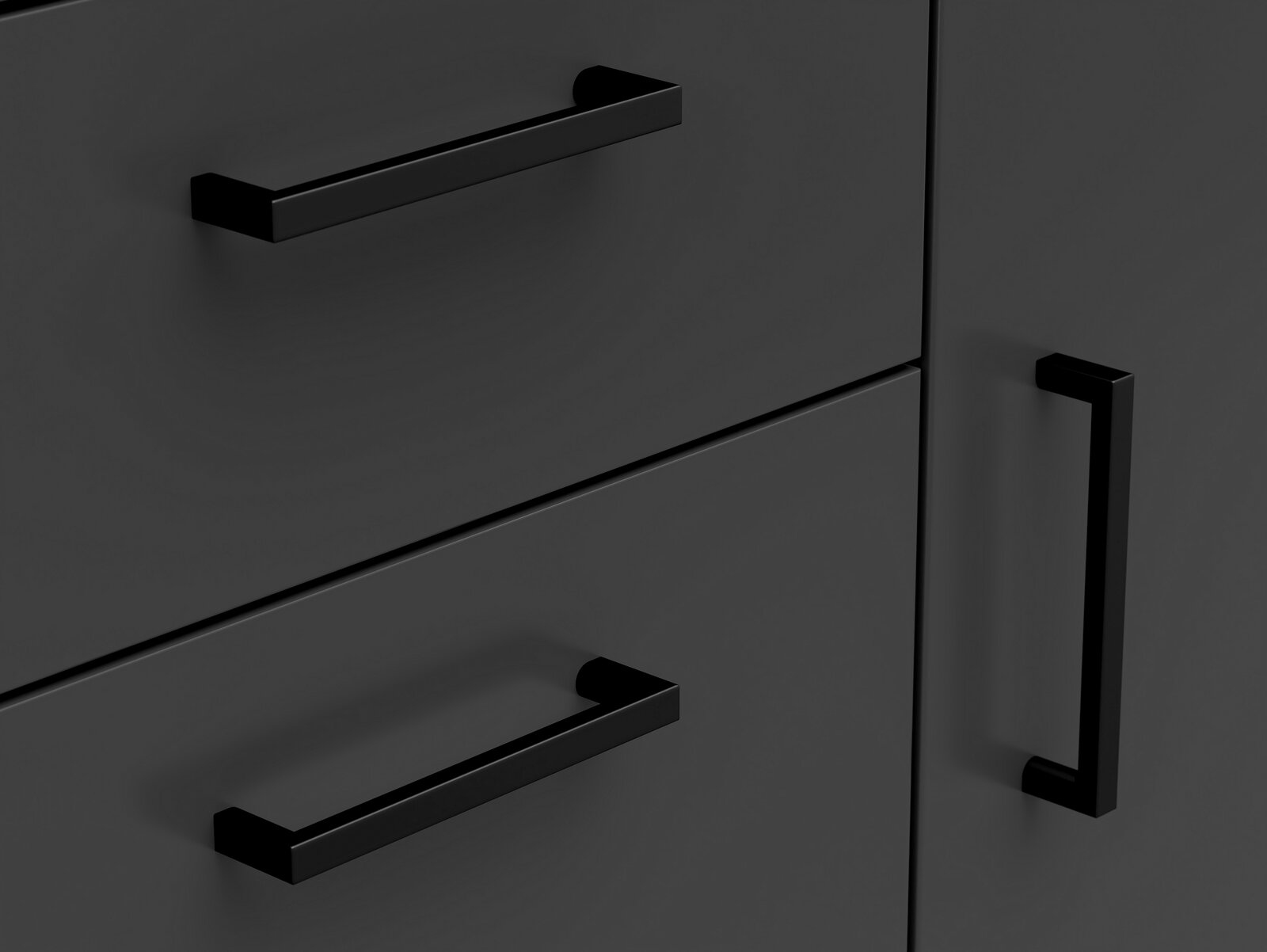 Nahaufnahme einer schwarzen Kommode mit modernen, rechteckigen Griffen, seitliche Perspektive