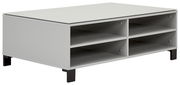 Moderner Couchtisch in Grau mit vier offenen Fächern, seitliche Perspektive