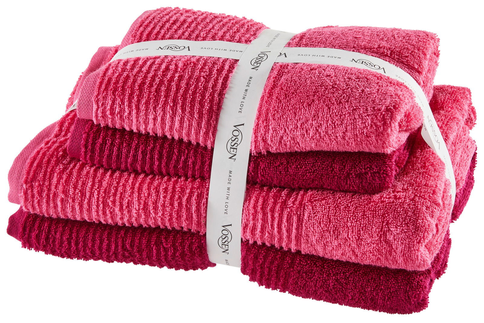 Vierteiliger Handtuchset in verschiedenen Rottönen, gestapelt und mit Vossen-Band umwickelt, aus seitlicher Perspektive.