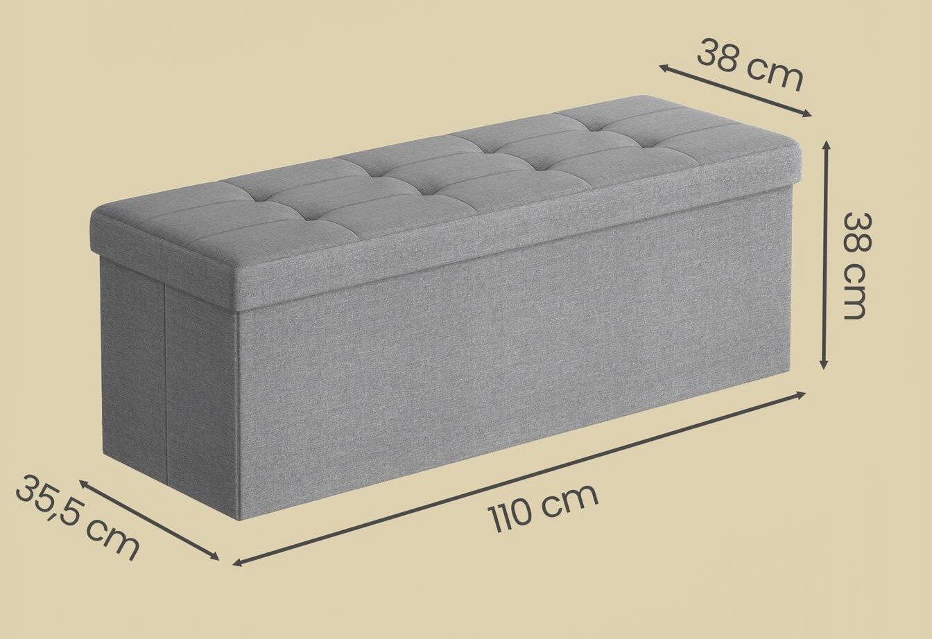 Graue, gepolsterte Sitzbank mit Stauraum und gesteppter Sitzfläche, Maße ca. 110 x 35,5 x 38 cm, dargestellt in schräger Seitenansicht (3/4-Perspektive) von vorne links.