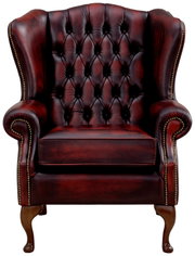 Elegante oorfauteuil van donkerrood leer met knopen, gefotografeerd van voren.
