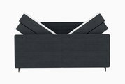 Boxspringbett in dunklem Stoffbezug, seitliche Perspektive mit verstellbarem Kopfteil