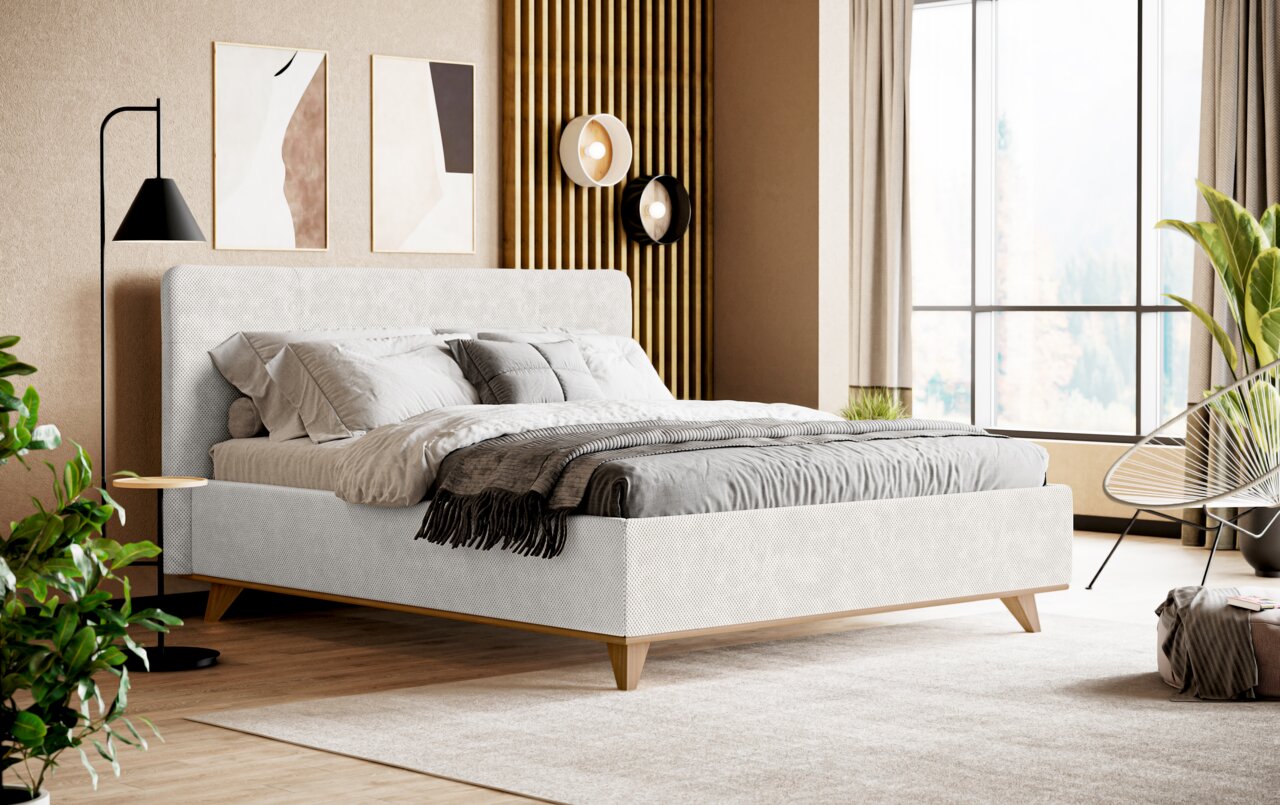 Modernes Polsterbettgestell in einem stilvoll eingerichteten Schlafzimmer, seitliche Perspektive
