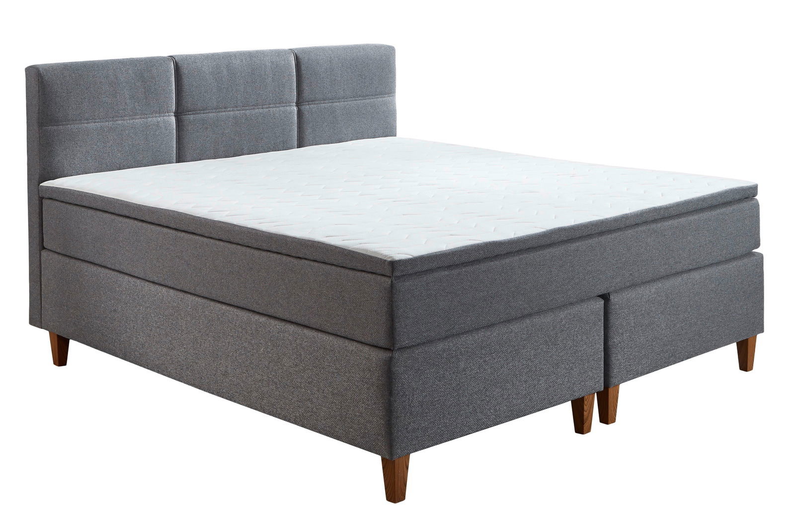 Intro Boxspringbett LINDOS Graues Boxspringbett LINDOS mit gepolstertem Kopfteil und Holzfüßen, seitliche Perspektive