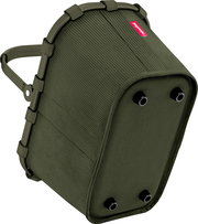 Olivgrüne Reisenthel Tasche/Organizer mit gerippter Stoffstruktur, umlaufendem Rahmen und Tragegriff, Seitenansicht schräg von oben auf weißem Hintergrund.
