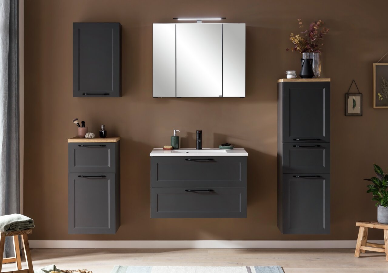 Moderner Midischrank in dunklem Design, Teil eines stilvollen Badezimmersets, frontal abgebildet.