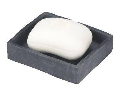 Seifenablage aus Schiefergestein mit rechteckiger Form, darauf liegt ein Stück weiße Seife. Ansicht von oben.