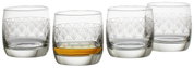 Vier Whiskybecher Paradisio mit elegantem Muster, einer teilweise mit Whisky gefüllt, aus frontaler Perspektive.