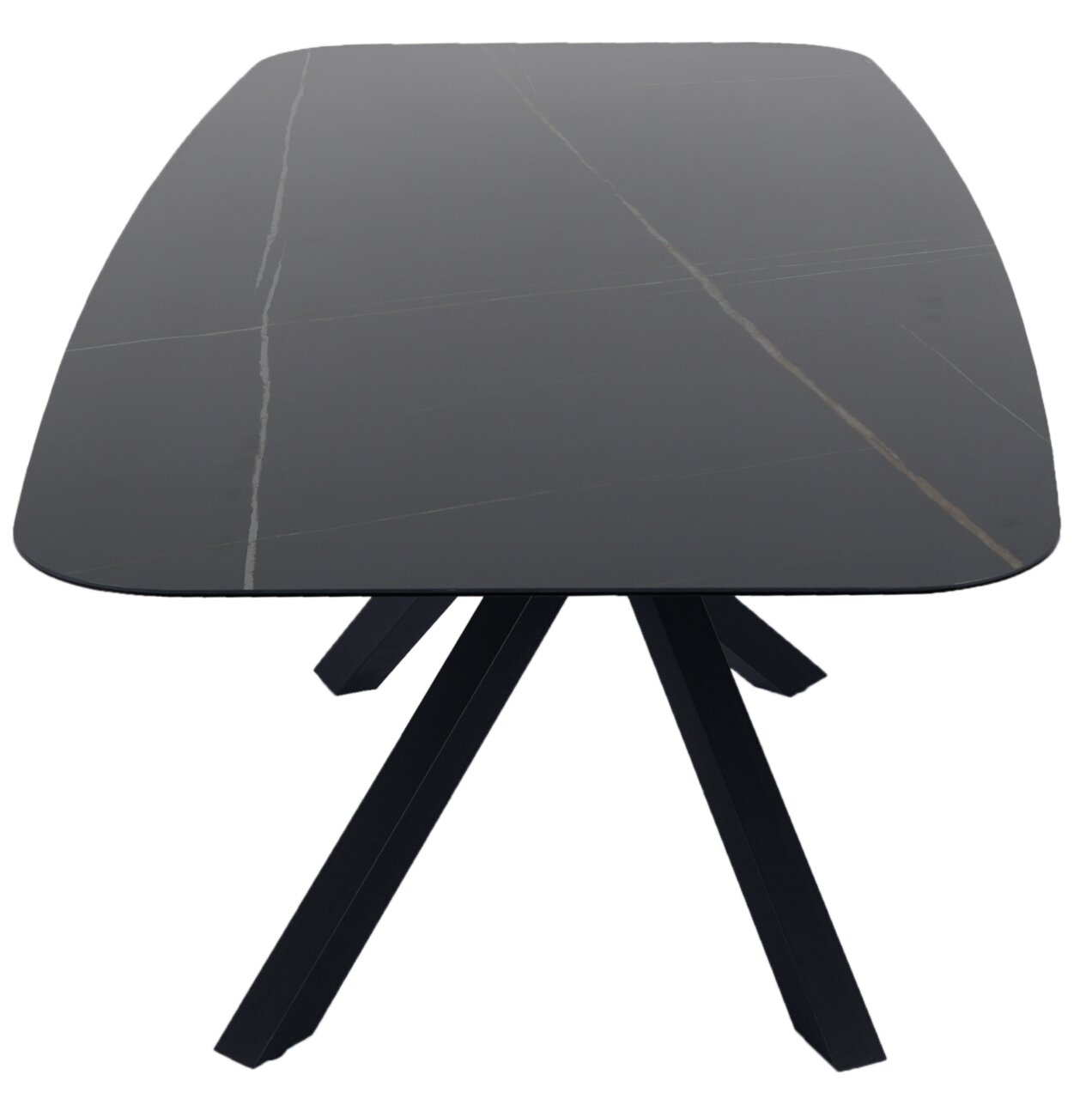 Moderner schwarzer Esstisch mit rechteckiger Tischplatte und schrägen Beinen, Ansicht von oben.